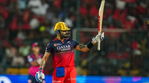 Royal Challengers Bengaluru's Virat Kohli celebrates his half century against Rajasthan Royals at M Chinnaswamy stadium in Bengaluru on Thursday, April 24, 2025.