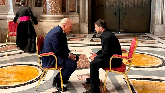 Volodymyr Zelenskyy, right, and Donald Trump talk as they attend the funeral of Pope Francis in Vatican on Saturday, April 26, 2025.