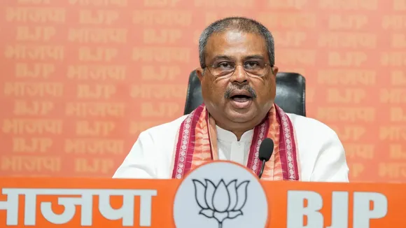  Union Minister and BJP leader Dharmendra Pradhan addresses a press conference at the BJP headquarters, in New Delhi.