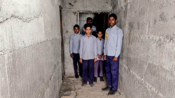 Students and staff at Govt Middle School, Saroola, in Rajouri district of J&K, Friday, May 2, 2025. Students of the school take shelter in the underground bunkers in case of firing at the LoC.