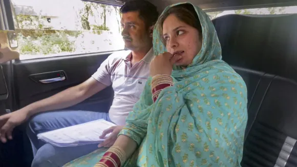 Munir Ahmed with his Pakistani wife Menal Khan image