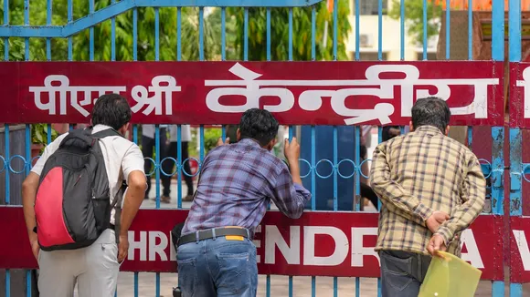 Relatives outside an examination centre ahead of the NEET UG exam 2025, conducted by the the National Testing Agency (NTA), in New Delhi, Sunday, May 4, 2025.