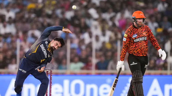 Gujarat Titans' Rashid Khan bowls a delivery against Sunrisers Hyderabad in Ahmedabad on Friday, May 2, 2025.