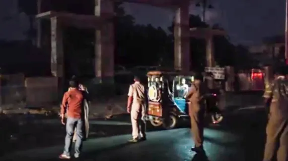 Security personnel on a road during blackout amid escalating tensions between India and Pakistan, in Barmer, Rajasthan