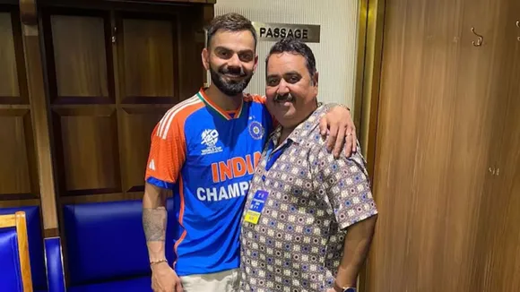 Virat Kohli with Rajkumar Sharma 