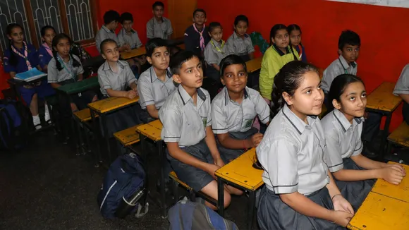 Students attend a class at a school after educational institutions reopened in non-border districts of Jammu following a bilateral understanding between India and Pakistan, in Jammu.