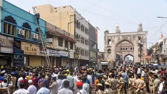 Firefighters carry out rescue and relief work after a fire broke out in a building near Gulzar Houz in the Old City area of Hyderabad in Telangana.