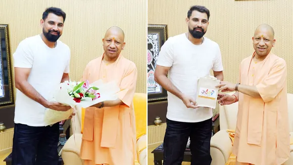 Mohd. Shami (L), CM Yogi Adityanath (R)