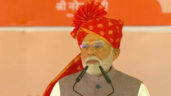 Prime Minister Narendra Modi addresses during the inauguration and foundation stone laying of various development projects, in Bikaner district, Rajasthan. 