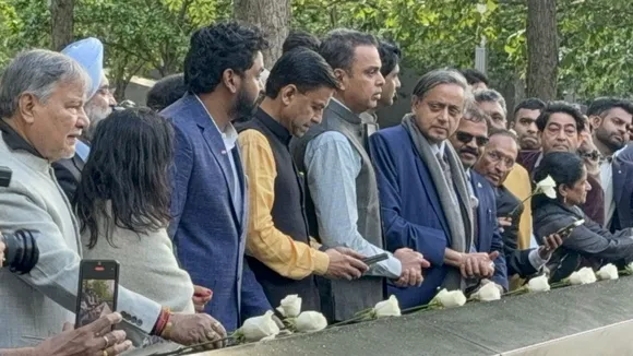Congress MP Shashi Tharoor with Shiv Sena MP Milind Deora and others pays tribute at the National September 11 Memorial, during their visit as part of a multi-party delegation, in New York.