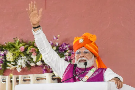 Prime Minister Narendra Modi speaks during the inauguration and foundation stone laying ceremony of various developmental works, in Dahod, Gujarat, Monday, May 26, 2025.