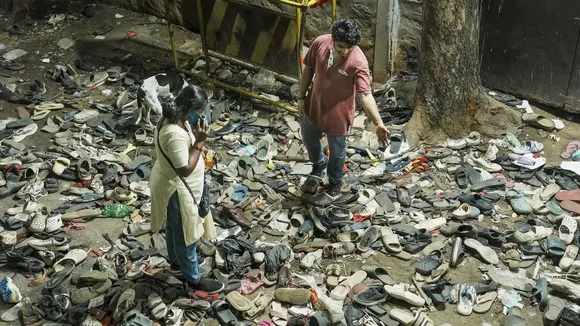 Footwears lie on the ground outside the Chinnaswamy Stadium following a stampede after a large number of fans gathered for the felicitation of IPL 2025 winning Royal Challengers Bengaluru team in Bengaluru on Wednesday, June 4, 2025.