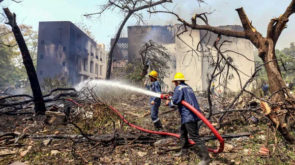 Firefighting team at the spot after a London-bound Air India plane crashed moments after taking off from the Ahmedabad airport