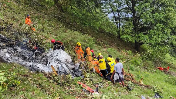 NDRF and SDRF personnel at the spot after a helicopter crashed near the Kedarnath shrine, in Rudraprayag district, Uttarakhand