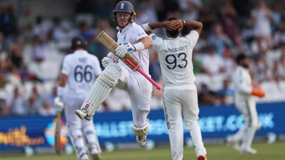 England’s Ollie Pope celebrates after scoring a century on day two of the first cricket test match against India at Headingley in Leeds, England on Saturday, June 21, 2025.