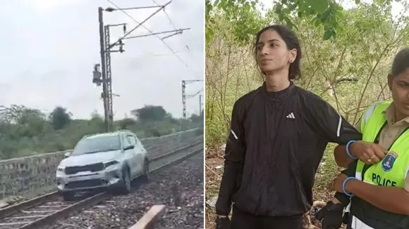 Hyderabad Woman drives car on railway track