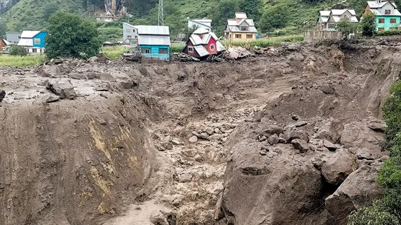 Houses are damaged after a cloudburst, in Kishtwar district, Jammu and Kashmir, Thursday, Aug. 14, 2025.