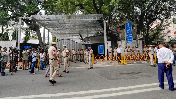 Police personnel outside Delhi CM Rekha Gupta's residence after an attack on her during a 'Jan Sunwai' programme, in New Delhi, Wednesday, Aug. 20, 2025.