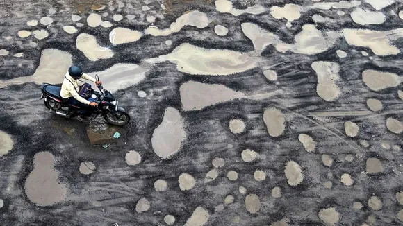 Potholes image Monsoon BMC MCD Mumbai Roads Highways Mumbai Rains Delhi Rains Waterlogging