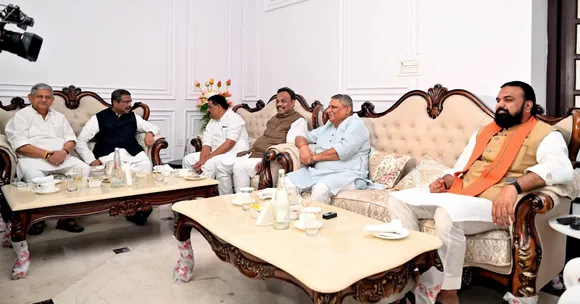 In this image posted on Oct. 10, 2025, from left, JD(U) leader Rajiv Ranjan Singh, BJP in-charge for Bihar polls Dharmendra Pradhan, JD(U) MP Sanjay Kumar Jha, BJP in-charge of Bihar Vinod Tawde, state minister Vijay Kumar Choudhary and state Deputy CM Samrat Choudhary during a meeting of the leaders of the NDA constituent parties regarding the Bihar Assembly elections.
