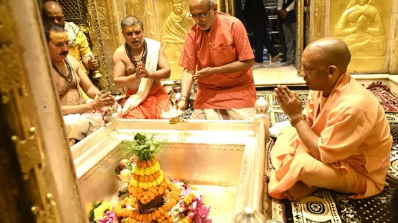 Vice President C.P. Radhakrishnan and Uttar Pradesh Chief Minister Yogi Adityanath offer prayers at the Kashi Vishwanath Temple, in Varanasi, on Friday, Oct 31, 2025.