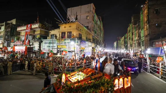 Narendra Modi with Union Minister Rajiv Ranjan during a roadshow ahead of Bihar Assembly elections, in Patna on Sunday, Nov 2, 2025.