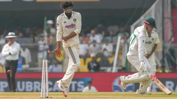 Ravindra Jadeja bowls during the day two of the second Test cricket match of a series between India and South Africa, at ACA Stadium in Guwahati, Sunday, Nov. 23, 2025.