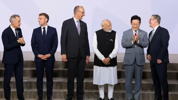 From left, Canada's Prime Minister Mark Carney, France's President Emmanuel Macron, Germany's Chancellor Friedrich Merz, India's Prime Minister Narendra Modi, South Korea's President Lee Jae Myung, and British Prime Minister Keir Starmer stand as leaders pose for a group photo, on the opening day of the G20 Leaders' Summit, in Johannesburg, South Africa, Saturday, Nov. 22, 2025. (AP/PTI)