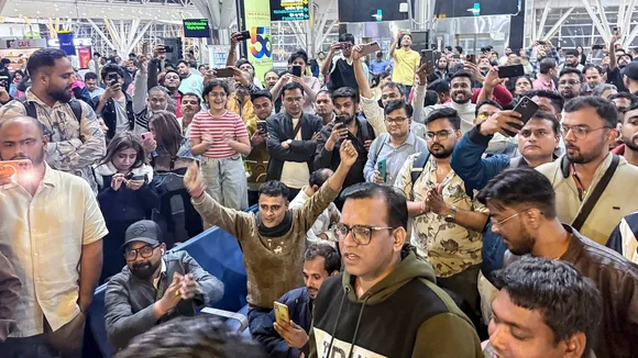Stranded passengers at Swami Vivekananda Airport, in Raipur, Chhattisgarh, late Thursday, Dec. 4, 2025.