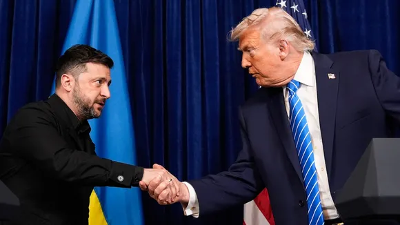 Donald Trump and Volodymyr Zelenskyy shake hands at the start of a joint news conference following a meeting at Trump's Mar-a-Lago club, Sunday, Dec. 28, 2025, in Palm Beach, Florida.