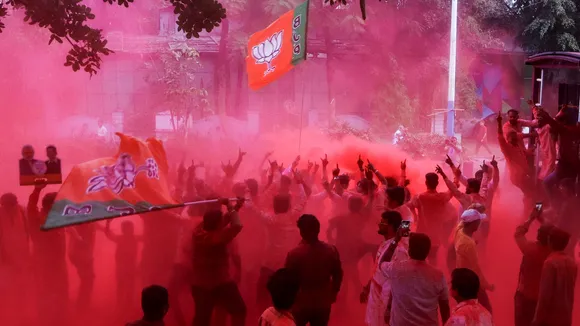 BJP members celebrate victory in the BMC elections 2026 at the party office, in Mumbai on Friday, Jan. 16, 2026.