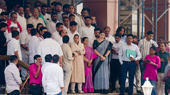 NCP leaders wait for late Maharashtra deputy chief minister and party chief Ajit Pawar's wife Sunetra Pawar before the party's legislature meeting, outside Vidhan Bhavan in Mumbai, Saturday, Jan. 31, 2026.