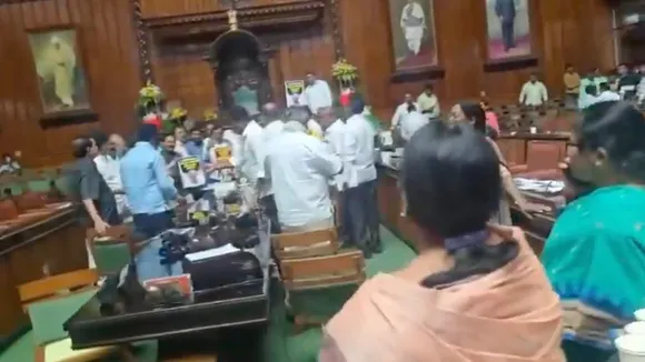 BJP leaders staged a protest inside the assembly demanding the resignation of the Excise Minister R.B. Timmapur, alleging rampant corruption in the excise department