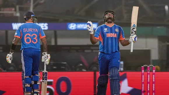 Sanju Samson, right, celebrates his half century with captain Suryakumar Yadav during the ICC Men’s T20 World Cup 2026 cricket match between India and West Indies, at the Eden Gardens, in Kolkata, West Bengal, Sunday, March 1, 2026.