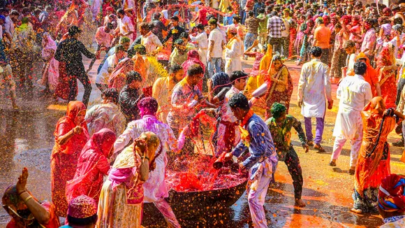People splash coloured water and celebrate Holi during the traditional Kodamar Holi festivities, in Beawar, Rajasthan, Wednesday, March 4, 2026.