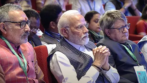 Prime Minister Narendra Modi and Union Minister of Rural Development Giriraj Singh during the launch of a week-long programme for Aspirational Blocks in the country called ‘Sankalp Saptaah’, at Bharat Mandapam, in New Delhi, Saturday