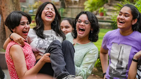 Students celebrate after the announcement of class 12th board exam results by the Central Board of Secondary Education (CBSE), in New Delhi, Monday, May 13, 2024