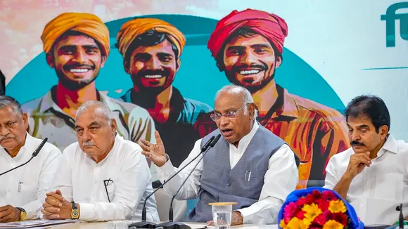 Congress President Mallikarjun Kharge with party leaders KC Venugopal and Bhupinder Singh Hooda addresses the media during the announcement of guarantees for the upcoming Haryana Assembly elections, in New Delhi, Wednesday, Sept. 18, 2024. 