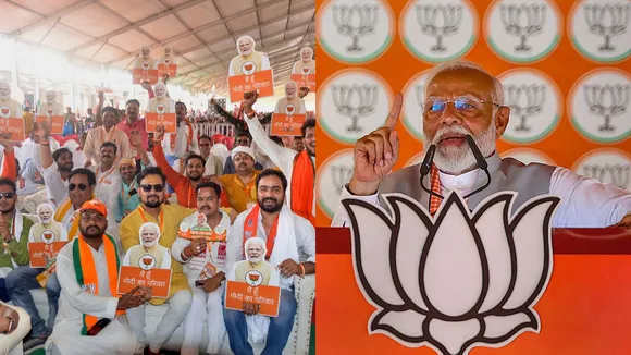 BJP supporters during Prime Minister Narendra Modi's public meeting for Lok Sabha elections, at Ghosi in Mau district, Sunday, May 26, 2024