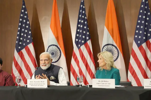India's Prime Minister Narendra Modi speaks as US first lady Jill Biden looks on at the National Science Foundation in Alexandria