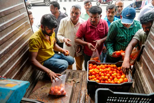 Tomatoes being sold at concessional rate through a mobile van by NCCF, in Lucknow, Saturday.jpg