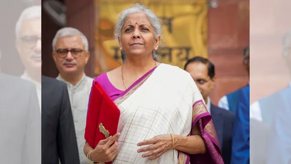 Union Finance Minister Nirmala Sitharaman poses with the case carrying the Union Budget 2024, at Finance Ministry, North Block in New Delhi, Tuesday, July 23, 2024.