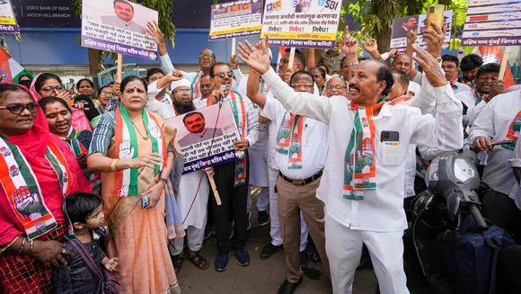 Congress party workers stage a protest against the Modi government over Adani row in Mumbai on Monday