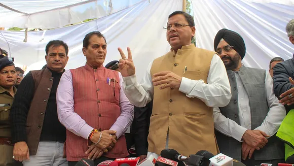 Uttarakhand Chief Minister Pushkar Singh Dhami with others addresses the media about the latest developments in the ongoing rescue operation