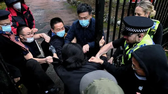 Hong Kong protester manhandled at Chinese consulate in UK