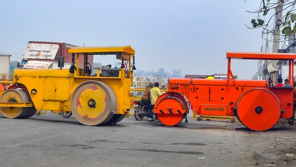 Road rollers, acting as a barricade, parked near Singhu border in view of farmers' 'Delhi Chalo March',