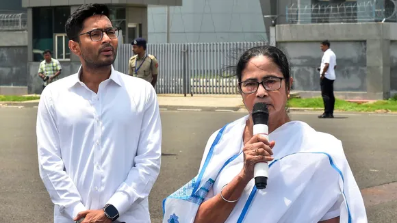 West Bengal Chief Minister and TMC chief Mamata Banerjee with the party's National General Secretary Abhishek Banerjee addresses the media at the Netaji Subhash Chandra Bose International Airport before leaving for Delhi, in Kolkata, Friday, July 26, 2024.