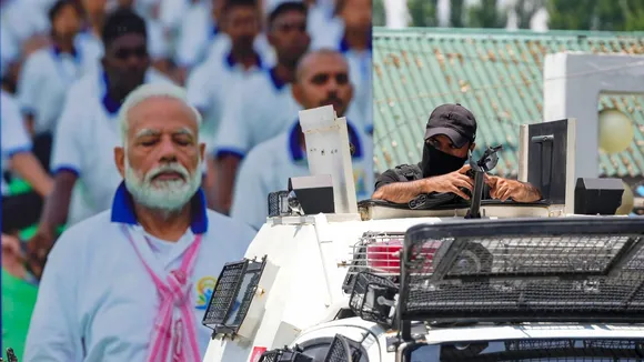 A security personnel guards near the SKICC on the eve of the International Day of Yoga, in Srinagar, Thursday, June 20, 2024.