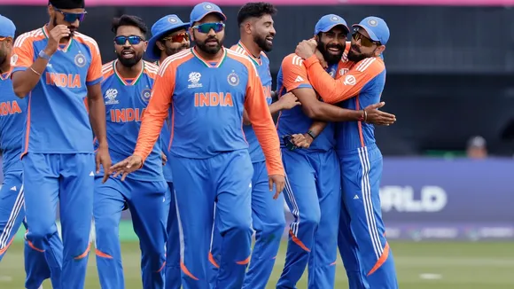 Jasprit Bumrah, second right, celebrates with teammates, Rohit Sharma at the front, after the dismissal of Pakistan's Iftikhar Ahmed at the Nassau County International Cricket Stadium in Westbury, New York, Sunday, June 9, 2024.