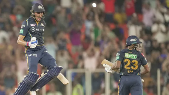 Gujarat Titans batter Shubman Gill celebrates his century during the IPL 2023 cricket playoff match between Gujarat Titans and Mumbai Indians at the Narendra Modi Stadium on May 26